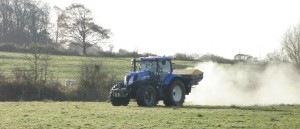 Tractor liming the field