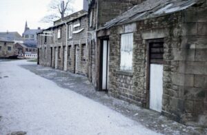 Punt-shaped signs hanging over the door of the Old Stables (now Water Witch Pub), circa 1970s