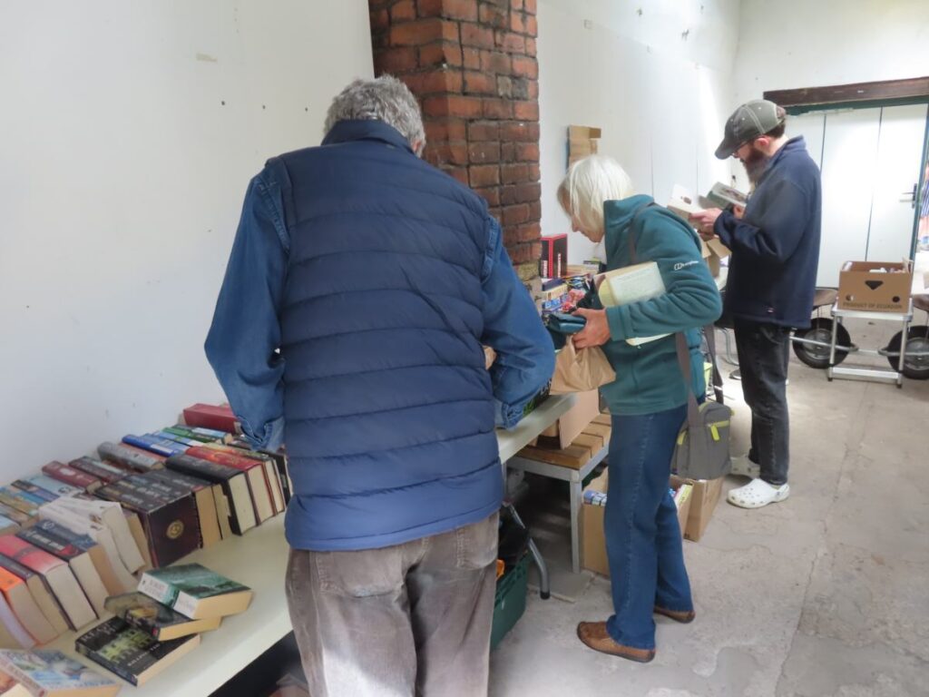 People looking at books - Triangle Summer Fair August 2025